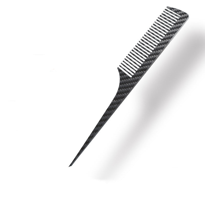 Close-up of a carbon fiber comb with a distinct woven pattern.