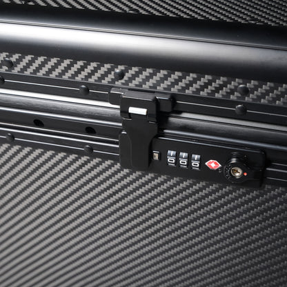 Close-up detail of a 3K carbon fiber large car storage trunk, showcasing the combination lock and the distinctive woven pattern.