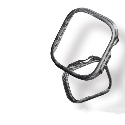 A close-up reveals an Apple Watch case crafted from 3K carbon fiber and forged carbon fiber, showcasing its distinctive woven texture in sharp detail.