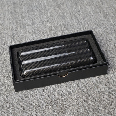 Close-up of a carbon fiber cigar tube with a capacity for 3 cigars, featuring a distinct woven pattern