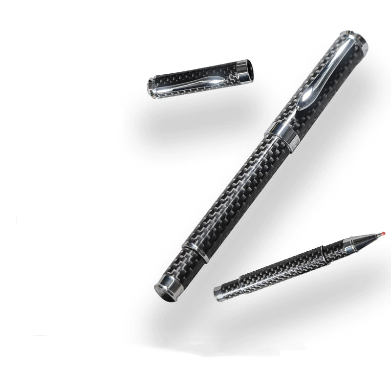 Close-up of a carbon fiber ballpoint pen with a distinct woven texture.