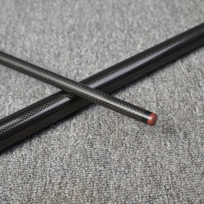 Two carbon fiber pool cue sections crossed over each other, featuring a textured carbon fiber finish with one section having a wooden tip