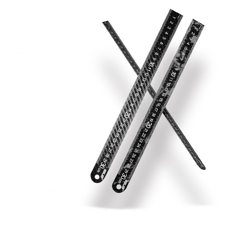Three carbon fiber rulers with clear measurement markings.