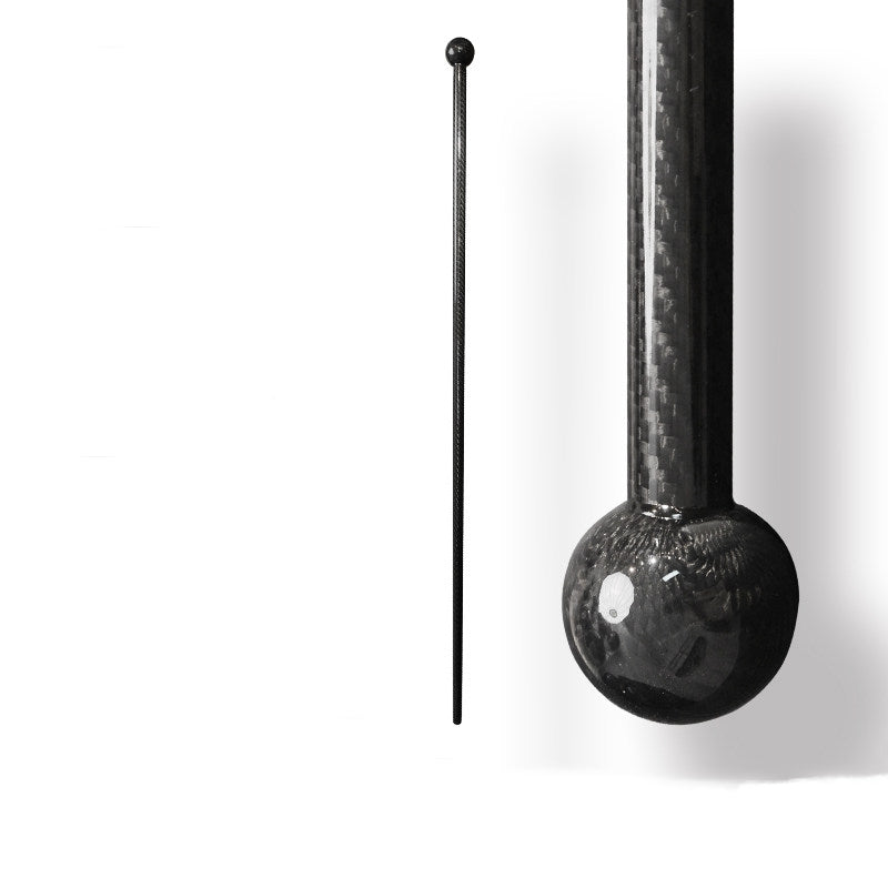 Close-up detail of a carbon fiber walking stick with a spherical top, showcasing the carbon fiber weave pattern.
